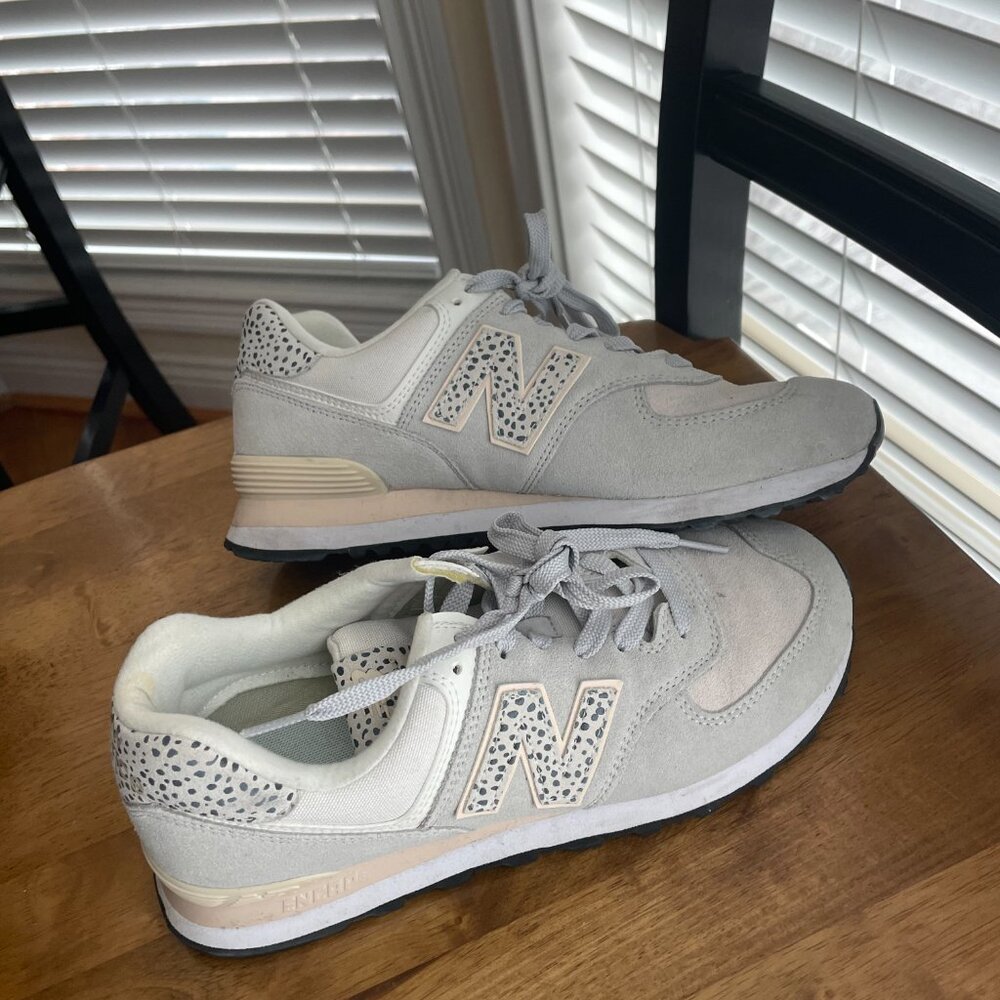 New Balance 574 animal sneakers in white and leopard